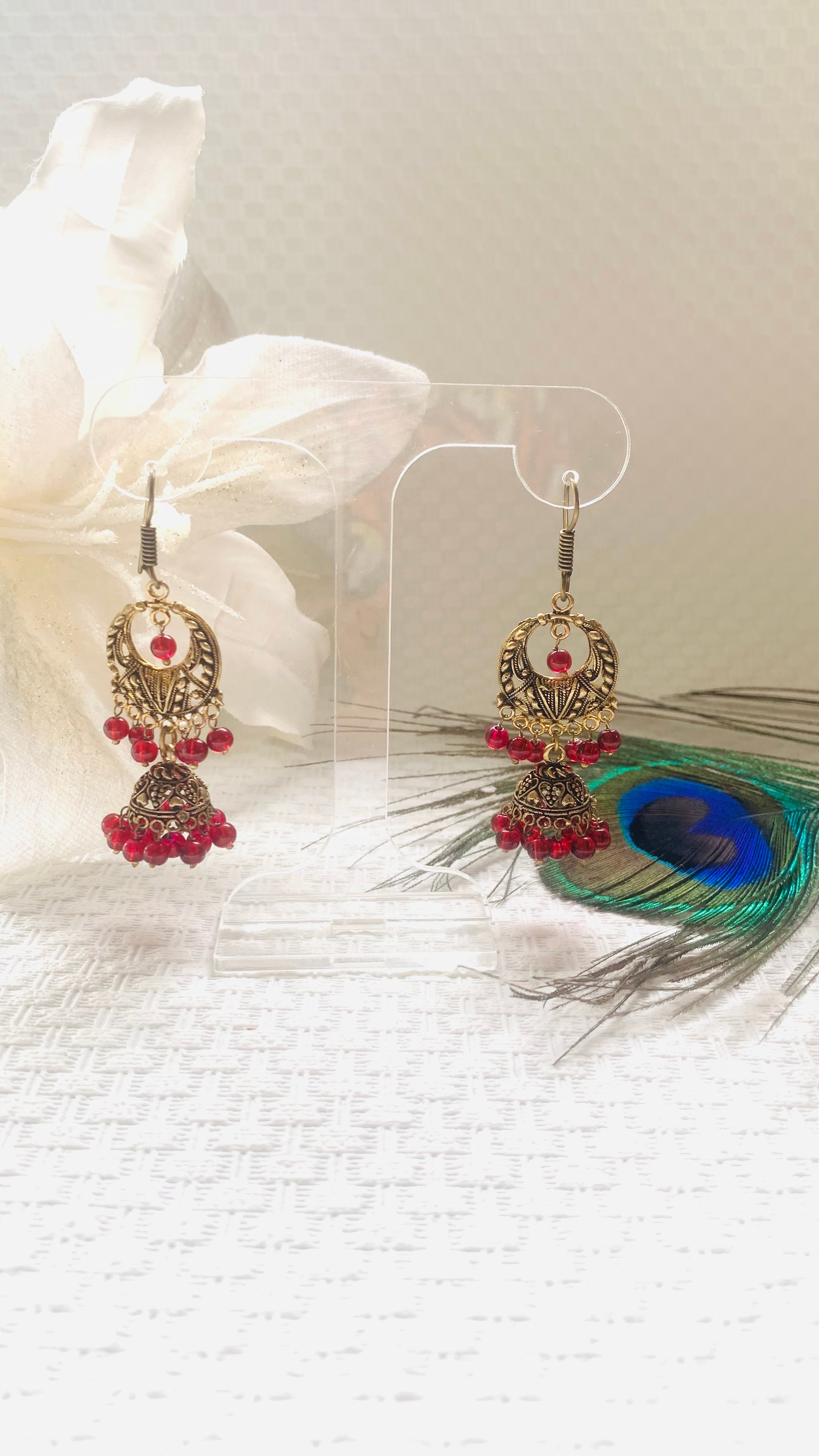 Red and antique gold jhumka earrings
